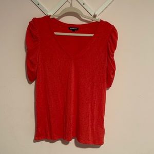 Express top with rouched sleeves. Feels like a tee, fits like a blouse! Size L
